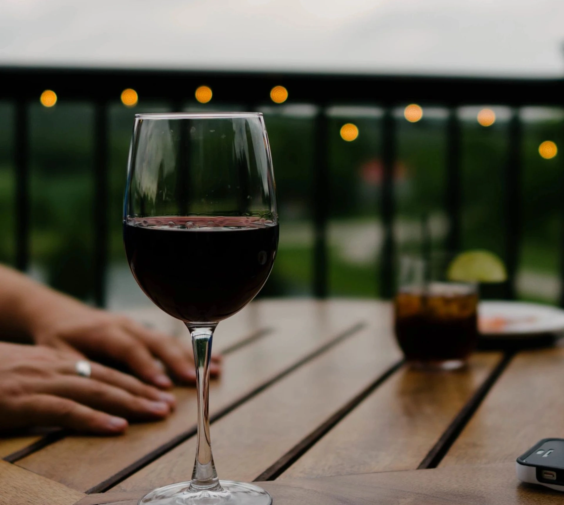 Wine glass on wooden table