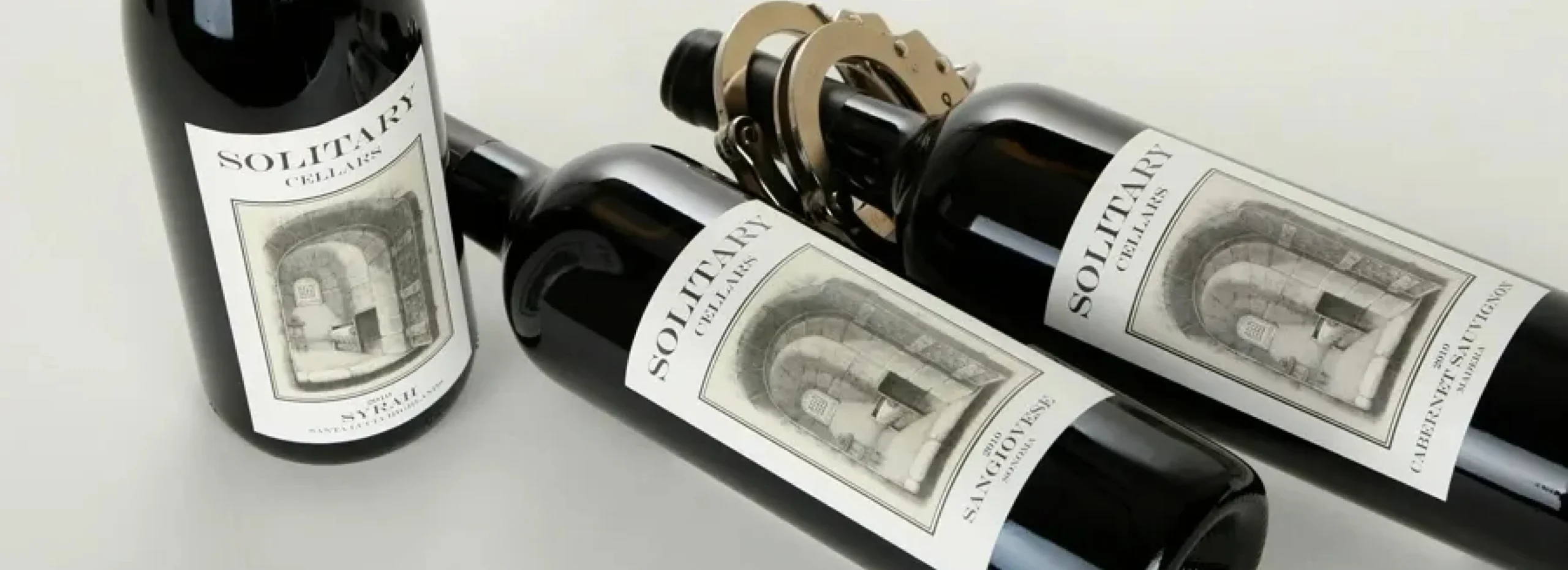 Elegant wine bottles with corkscrew