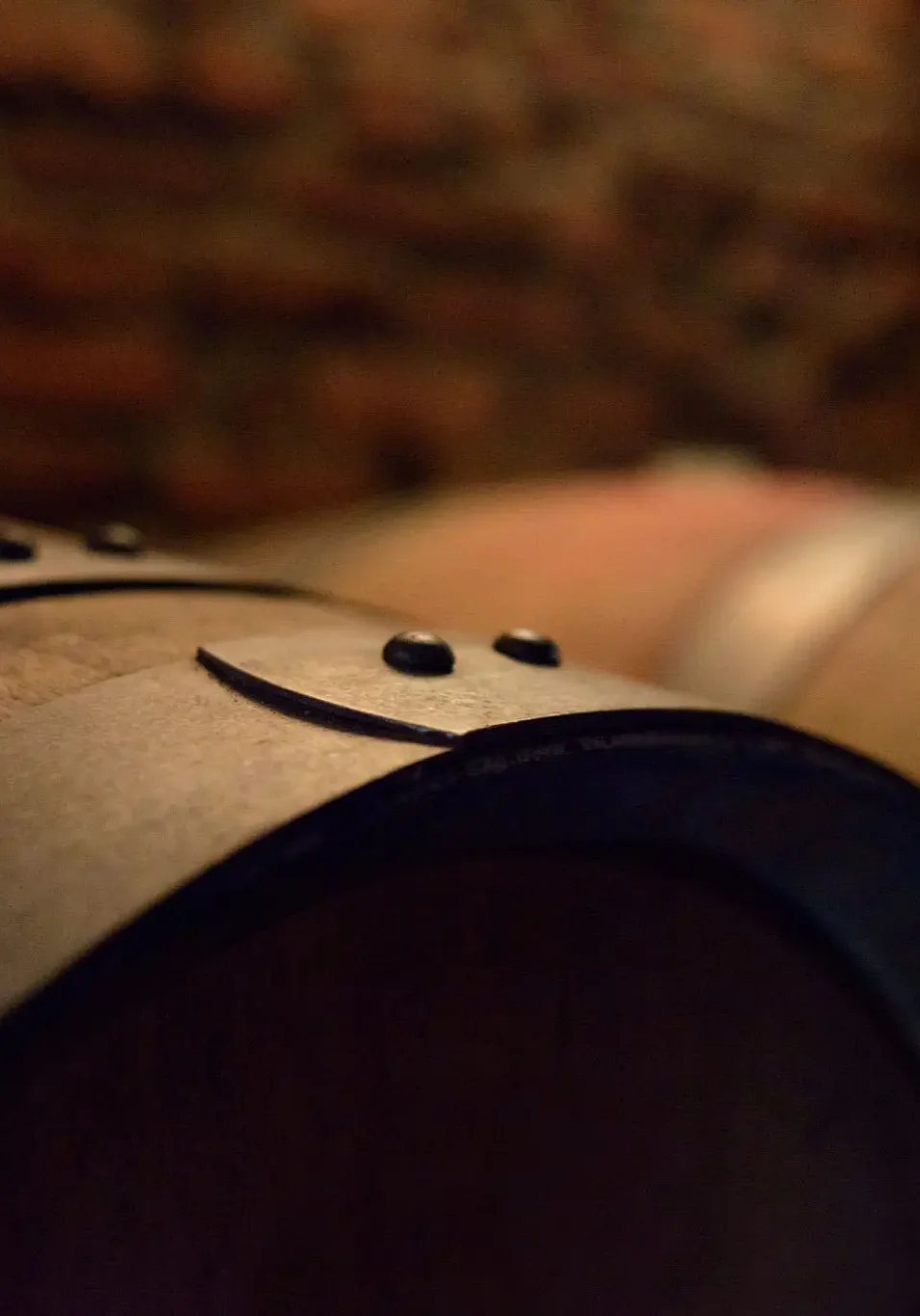 Wooden wine barrels in dim cellar